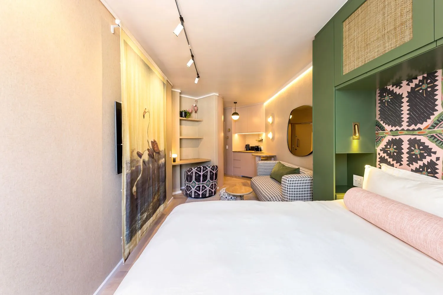 The bed and the artwork wall