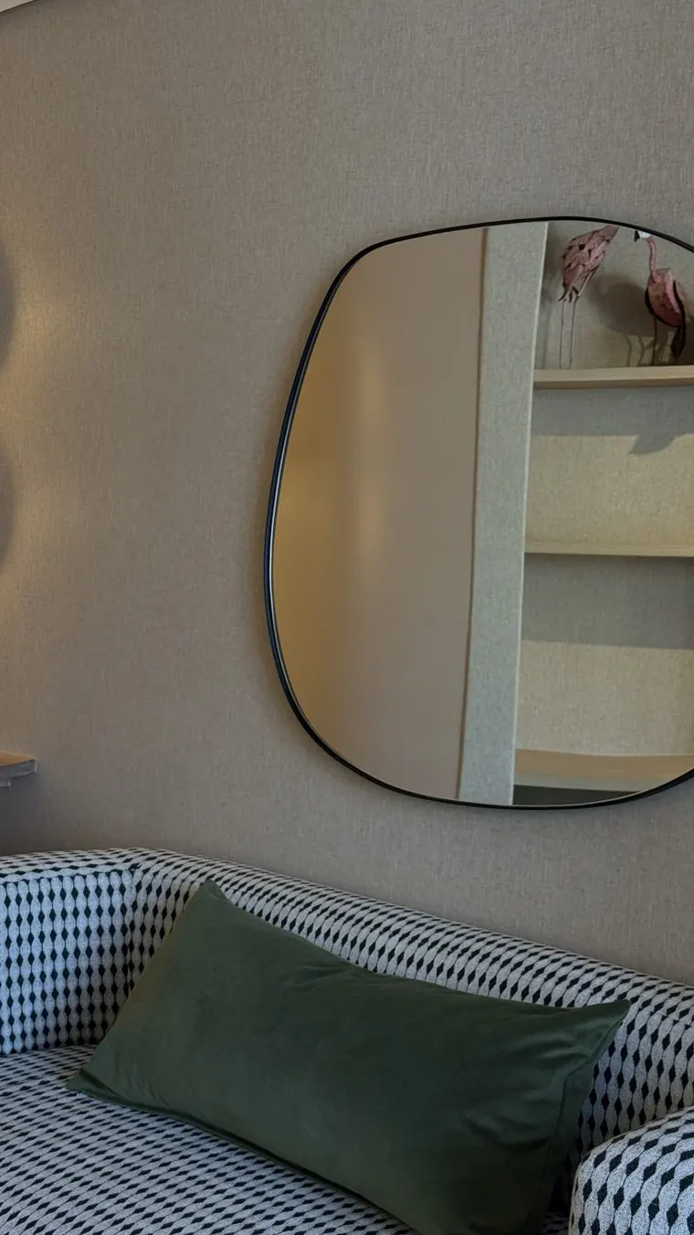 The sofa and the big mirror