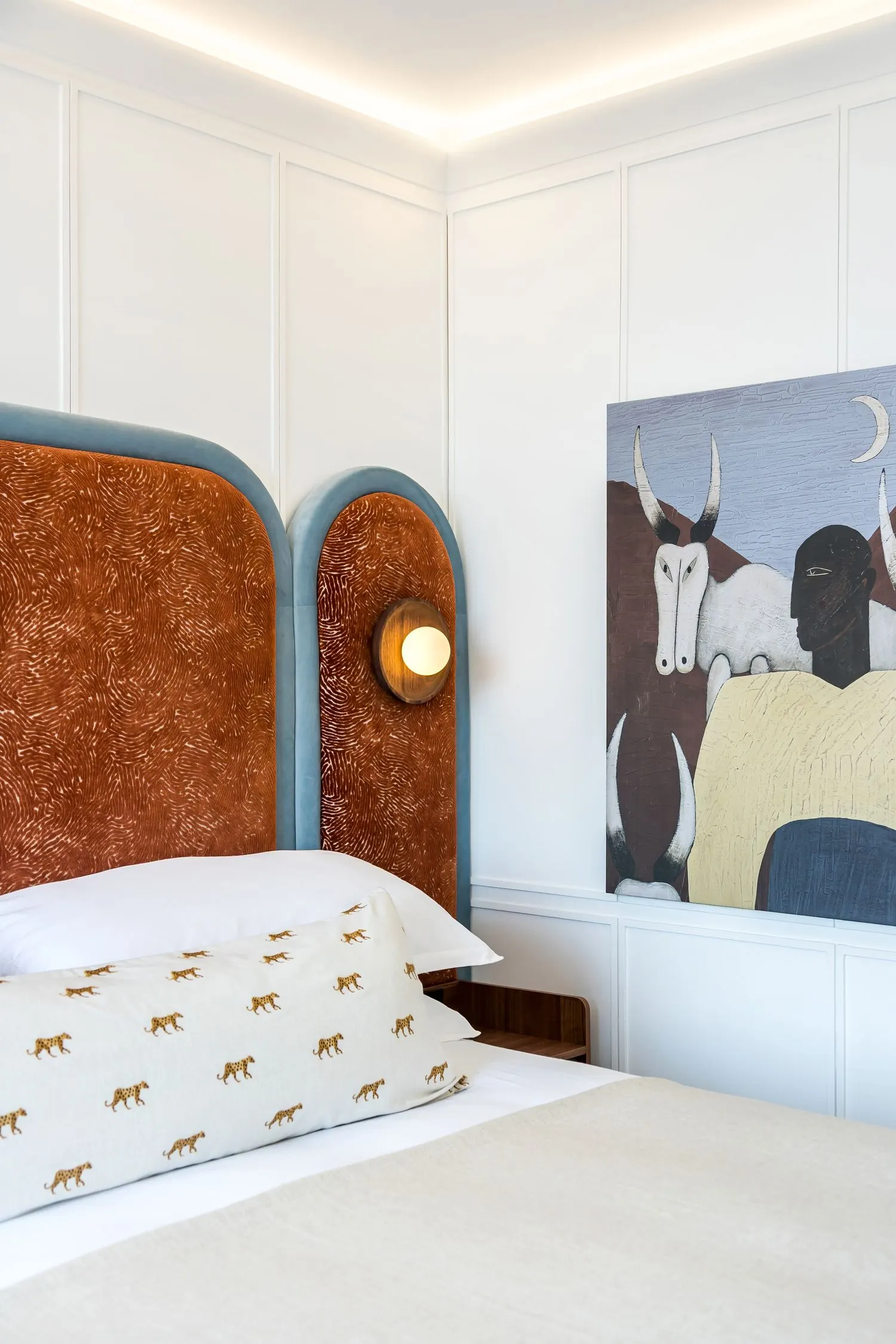 The headboard and the artwork