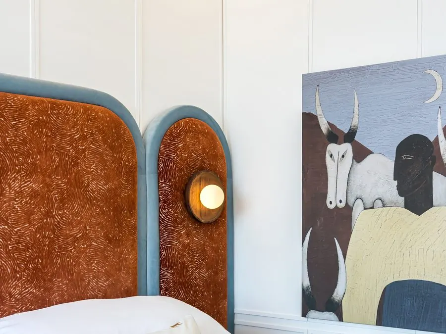 The headboard and the artwork